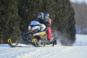 a snowmobile around Byrncliff Golf Resort, Western New York