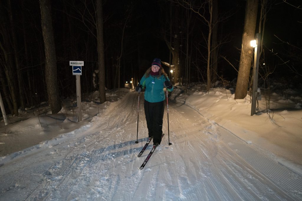 Lady cross country skiing at Byrncliff, Varysburg, NY