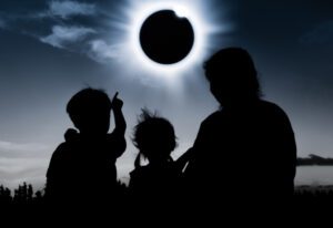 Family watching the eclipse, Byrncliff Golf Resort & Banquets, near Buffalo NY